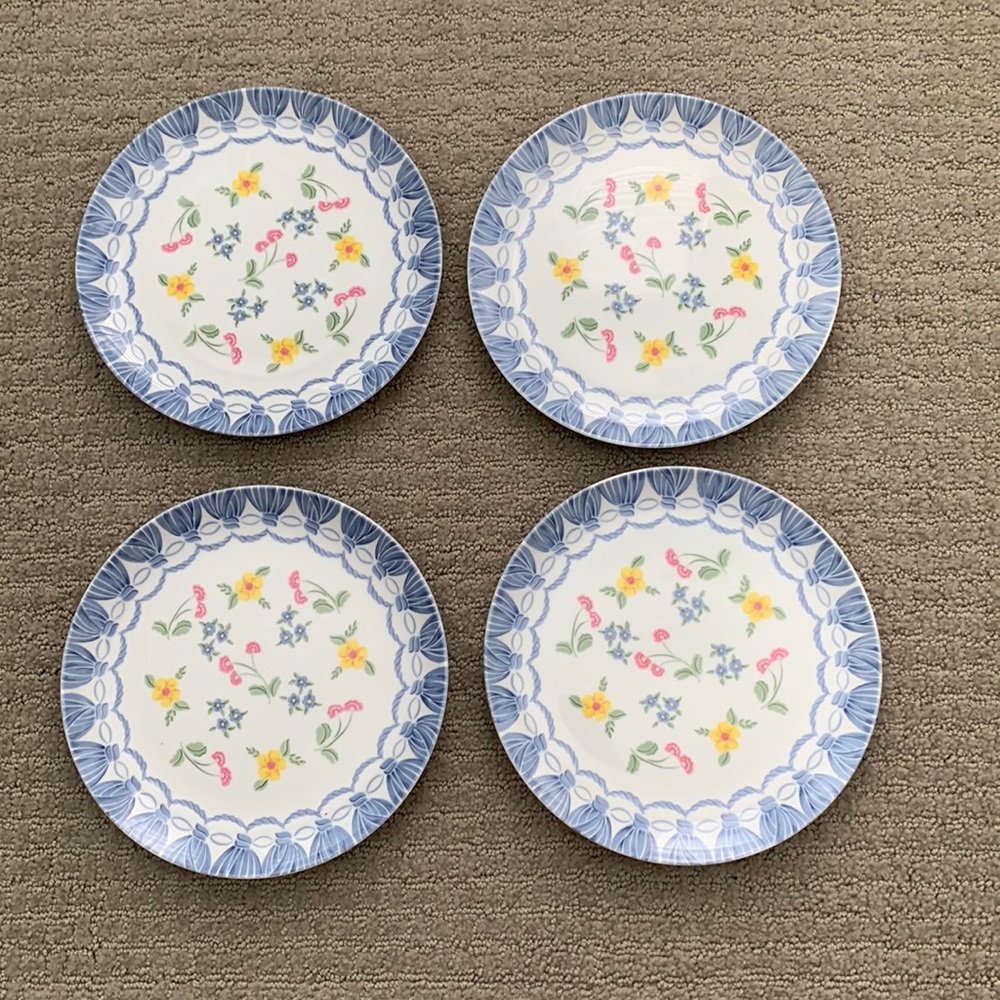 Vintage set of 4 plates by Sigma in Romance pattern.